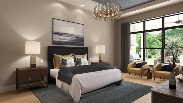 a bedroom with a large bed a chandelier and windows