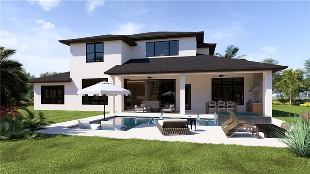 a front view of a house with swimming pool and sitting area