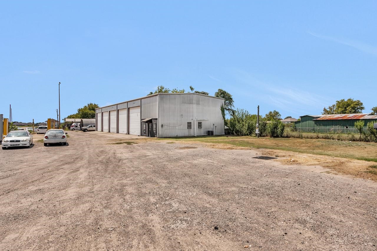 a view of a house with a ocean view