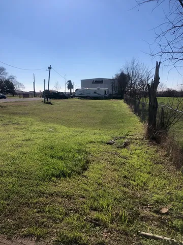 a view of a water with a building in the background