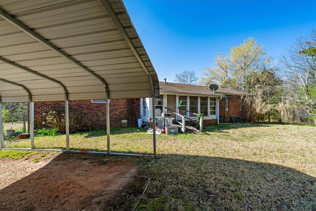 453 Deaton Road Walhalla, SC 29691 - Photo 14 of 28 This property features a practical carport, providing essential shelter for vehicles.
