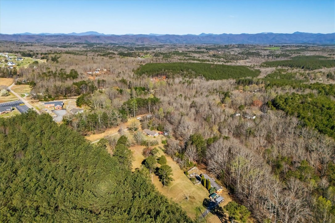 453 Deaton Road Walhalla, SC 29691 - Photo 22 of 28 Expansive acreage showcasing natural landscapes and distant mountain views.
