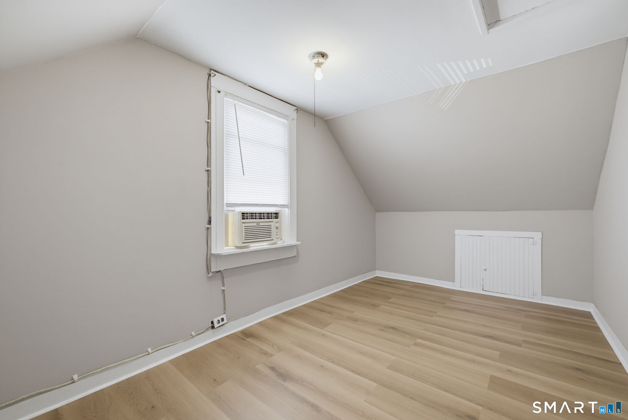 417 Hartford Road Manchester, CT 06040 - Photo 23 of 38 This room could be a den, workout space or guest room. Ceiling fan and crawl space storage.