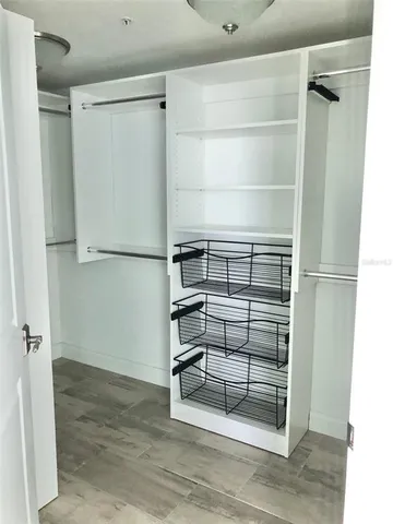 a view of an empty walk in closet