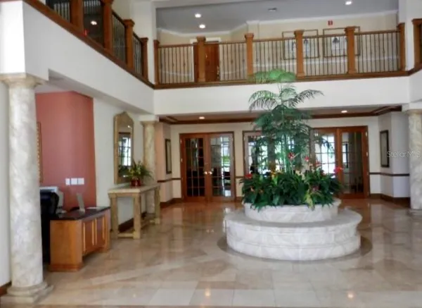 a view of a building with sitting area