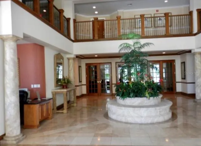 a view of a building with sitting area