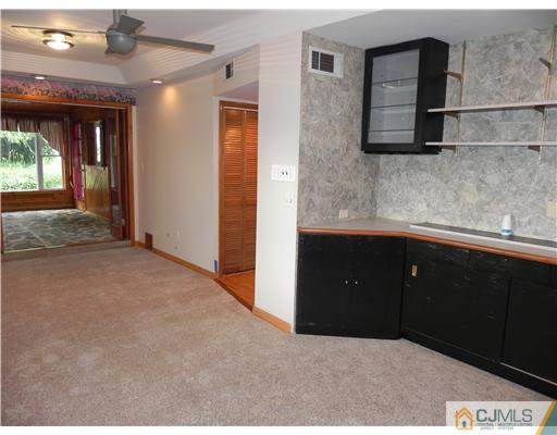 440 Old Post Road Edison, NJ 08817 - Photo 13 of 17 a kitchen with a sink and cabinets