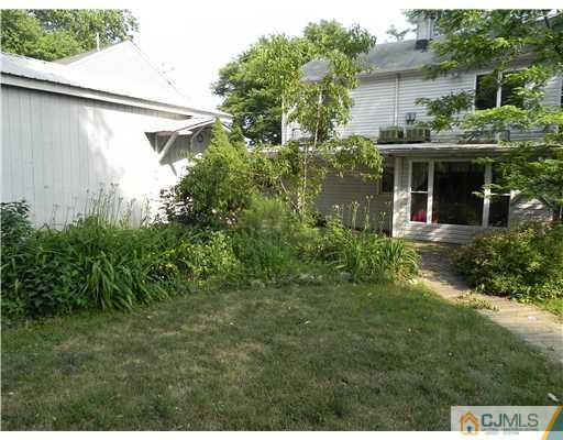 440 Old Post Road Edison, NJ 08817 - Photo 17 of 17 a front view of house with yard and trees