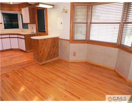 440 Old Post Road Edison, NJ 08817 - Photo 5 of 17 a view of a room with wooden floor and cabinet