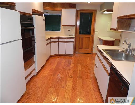 440 Old Post Road Edison, NJ 08817 - Photo 6 of 17 a kitchen with stainless steel appliances granite countertop a refrigerator and a sink