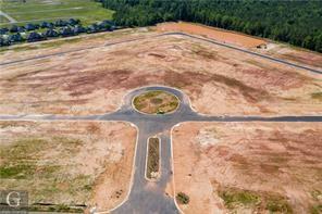 0 Pin Oak Landing, Unit 16 Haughton, LA 71037 - Photo 3 of 8 a picture of a white house with a small yard