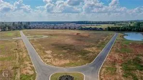 a view of a terrace with yard