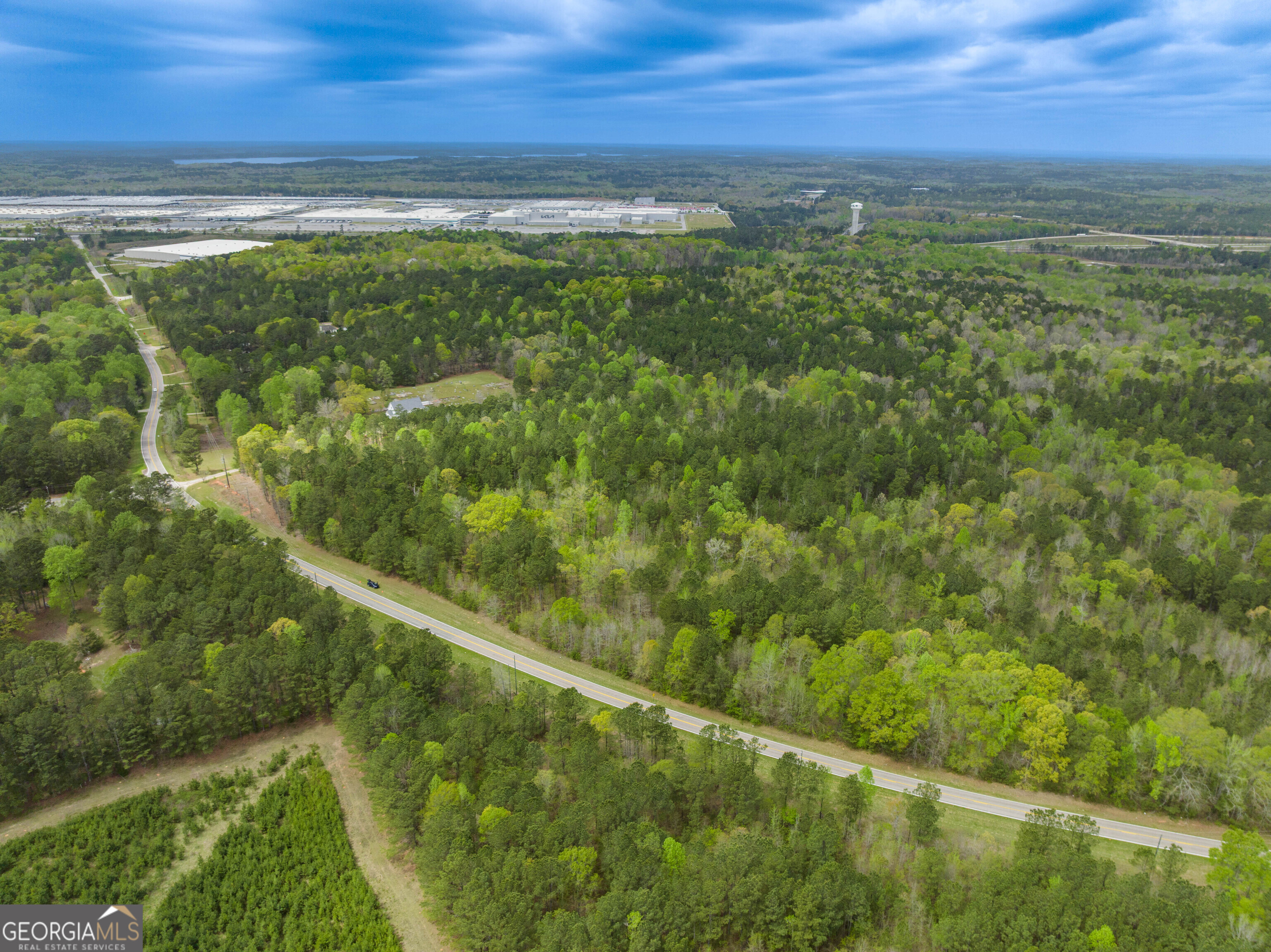 4172 Bartley Road West Point, GA 31833 - Photo 6 of 13 a view of a lake from a yard