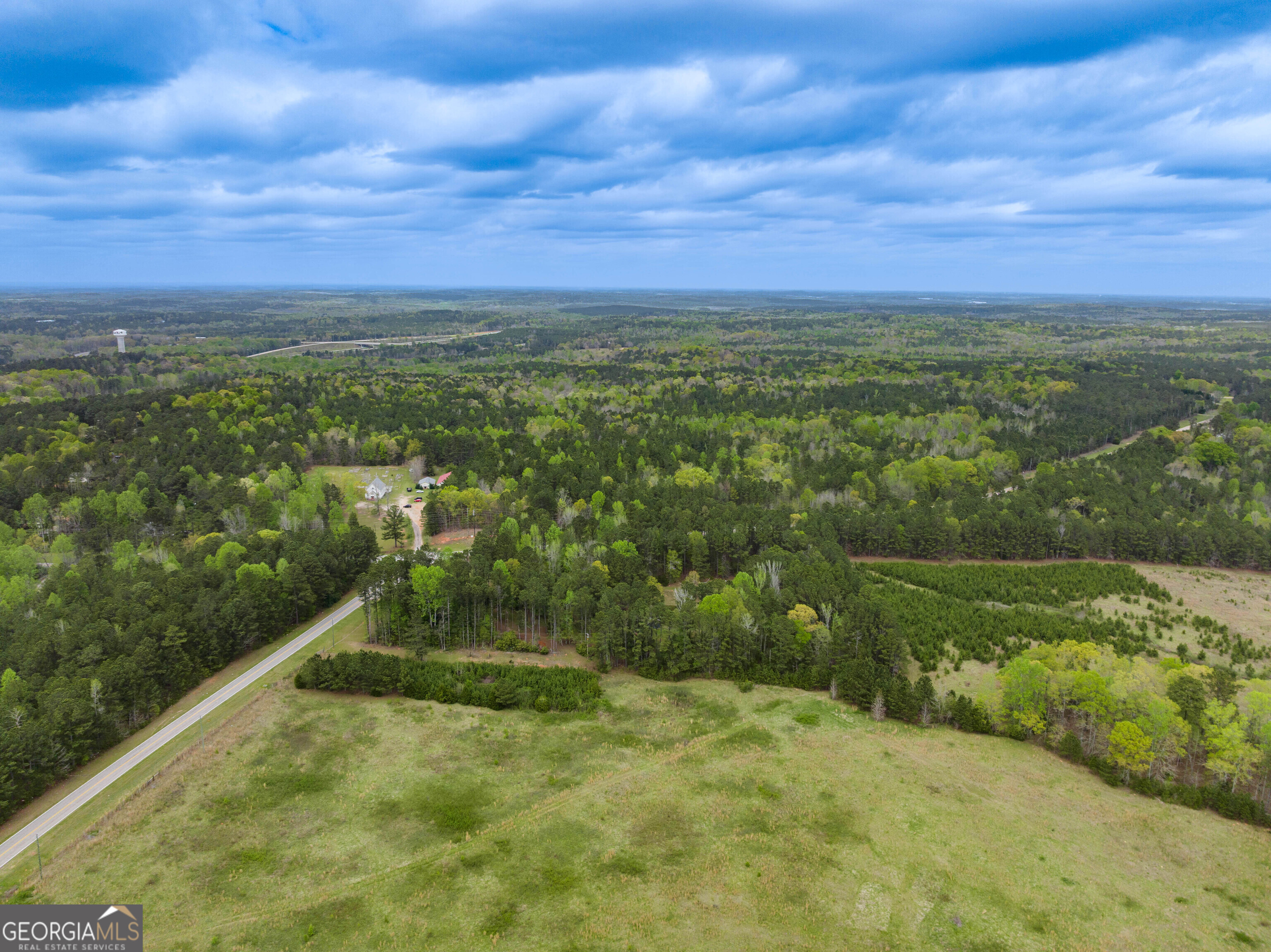 4172 Bartley Road West Point, GA 31833 - Photo 8 of 13 a view of a field with an ocean