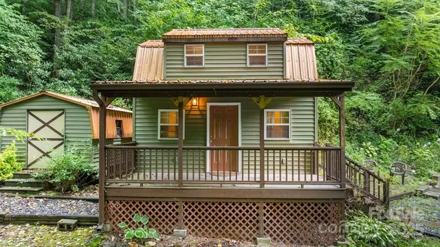 a house view with a garden space