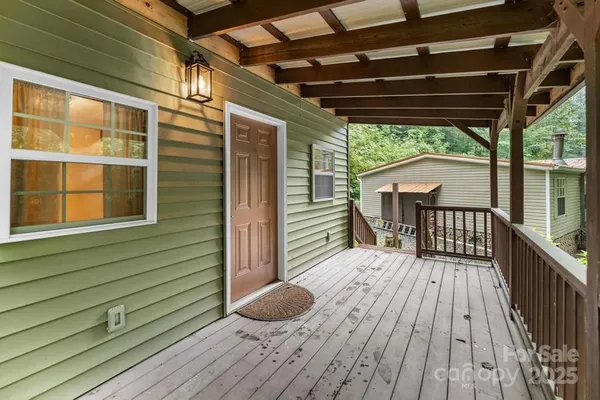 a view of deck with wooden floor and outdoor space