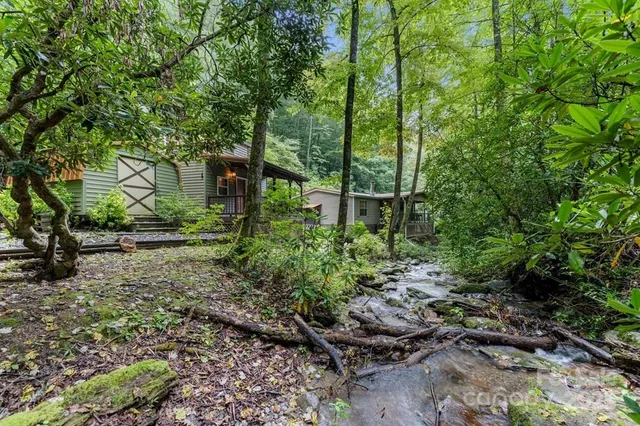 a backyard of a house with lots of green space