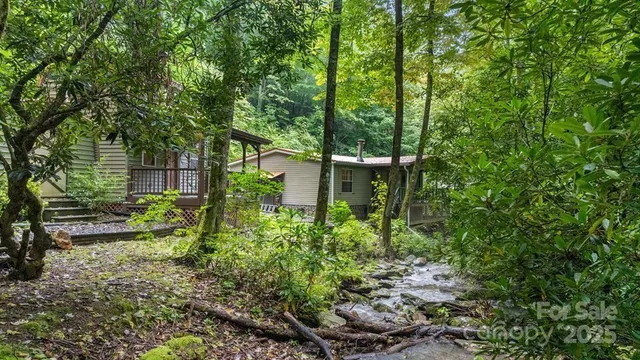 a backyard of a house with lots of green space