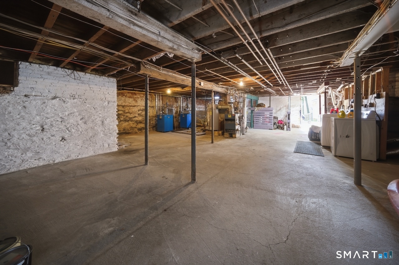 12 Webster Street Vernon, CT 06066 - Photo 25 of 33 a view of empty room with wooden ceiling
