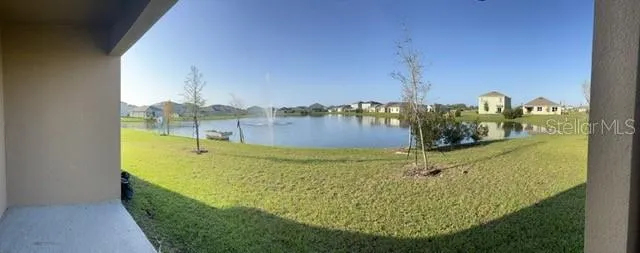 an aerial view of a house and outdoor space
