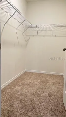 a bathroom with a granite countertop toilet a sink and bathtub