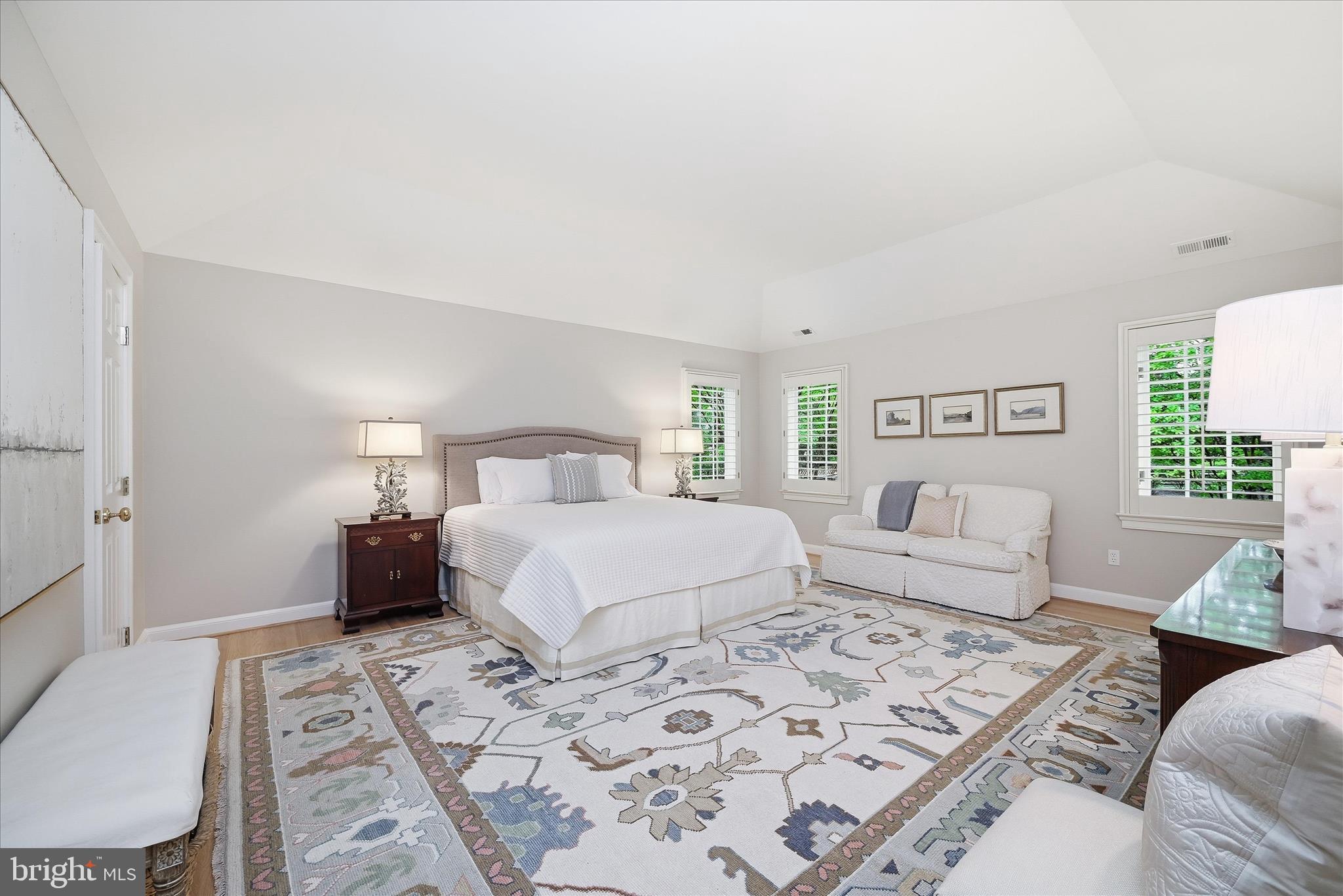 3824 Military Road Arlington, VA 22207 - Photo 26 of 54 a bedroom with a large bed and a couch