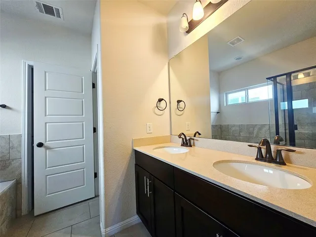 a view of room with staircase and windows