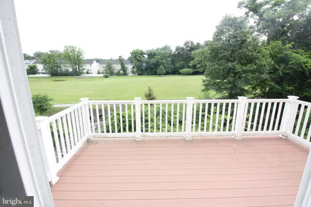 a view of a wooden fence