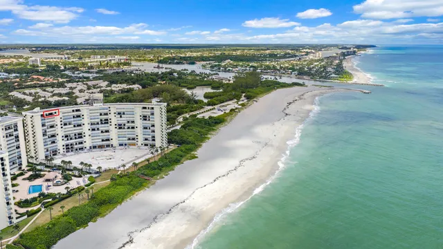 a view of a city with an ocean view