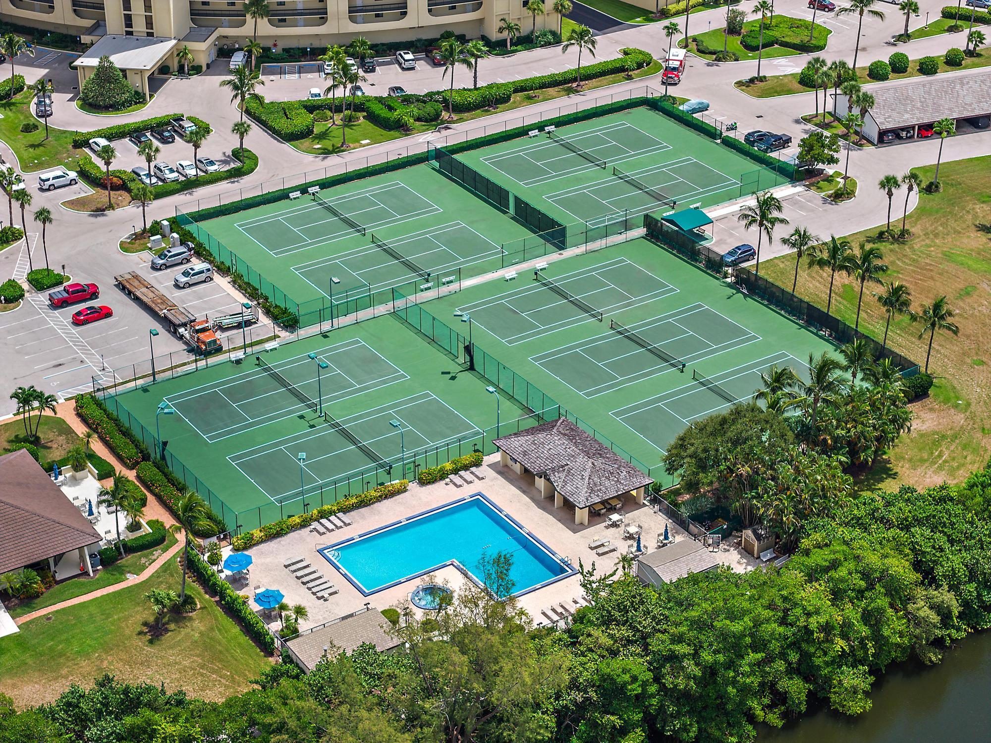 400 Ocean Trail Way, Unit 1409 Jupiter, FL 33477 - Photo 27 of 30 an aerial view of a tennis ground and a cars park side of the road