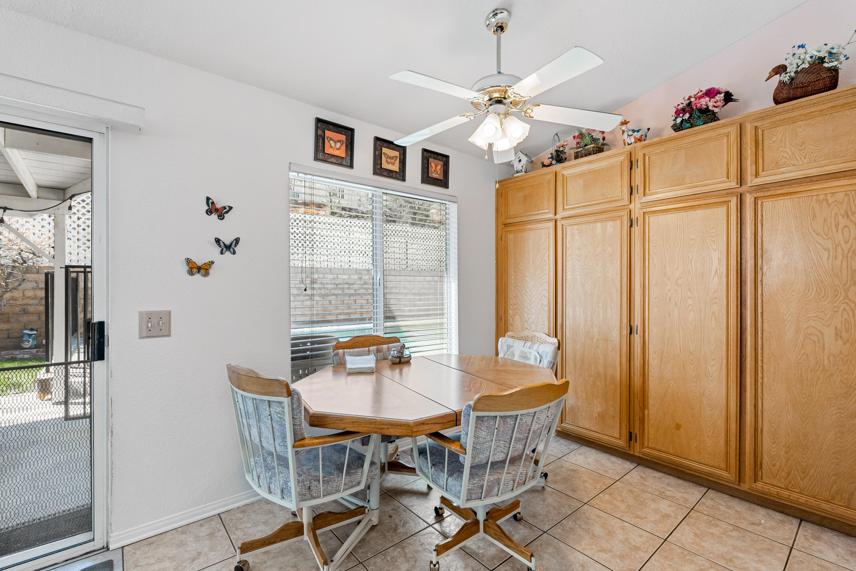 3030 Quarry Road Palmdale, CA 93550 - Photo 15 of 46 a view of a dining room with furniture window and outside view
