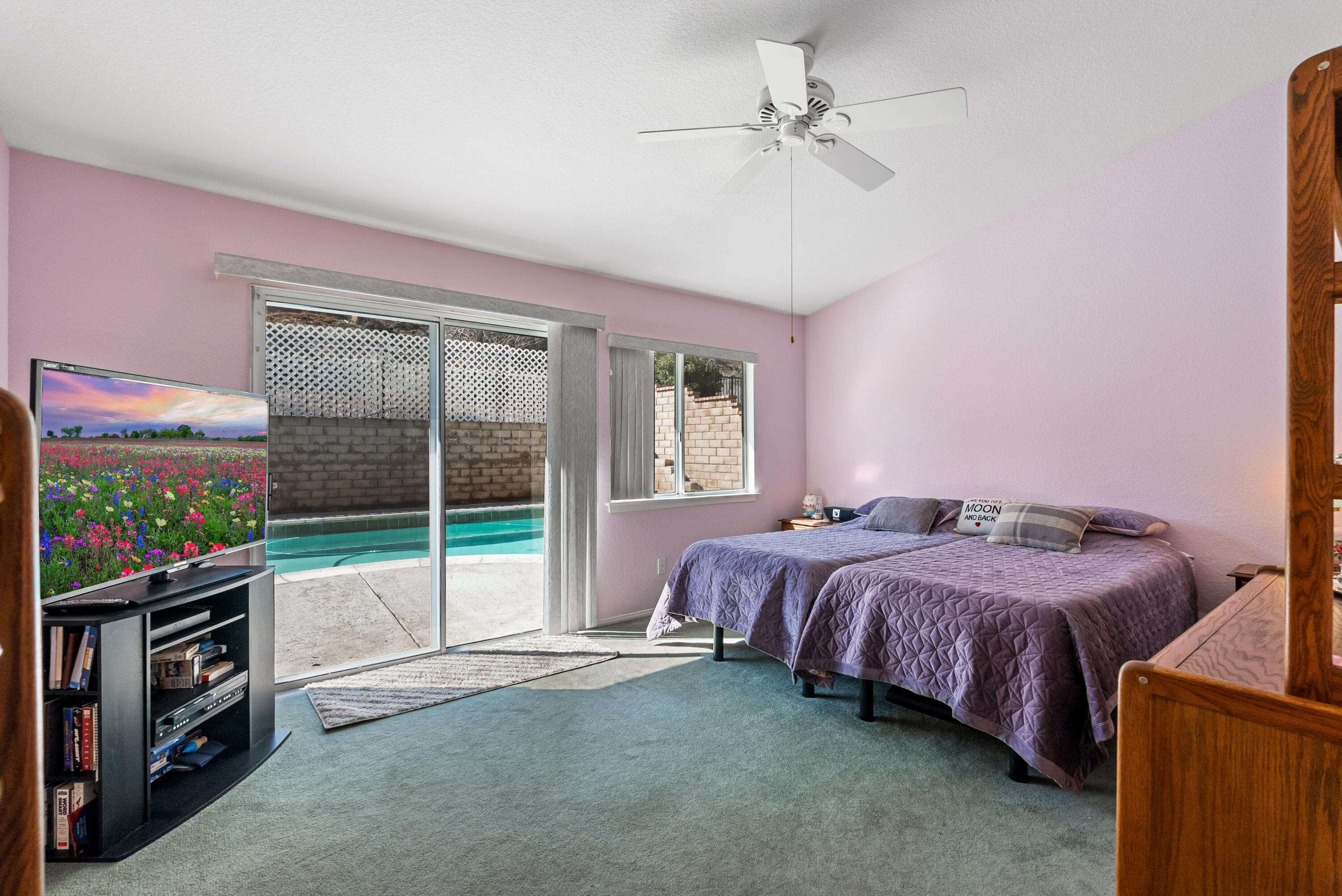 3030 Quarry Road Palmdale, CA 93550 - Photo 20 of 46 a bed room with a bed and a television