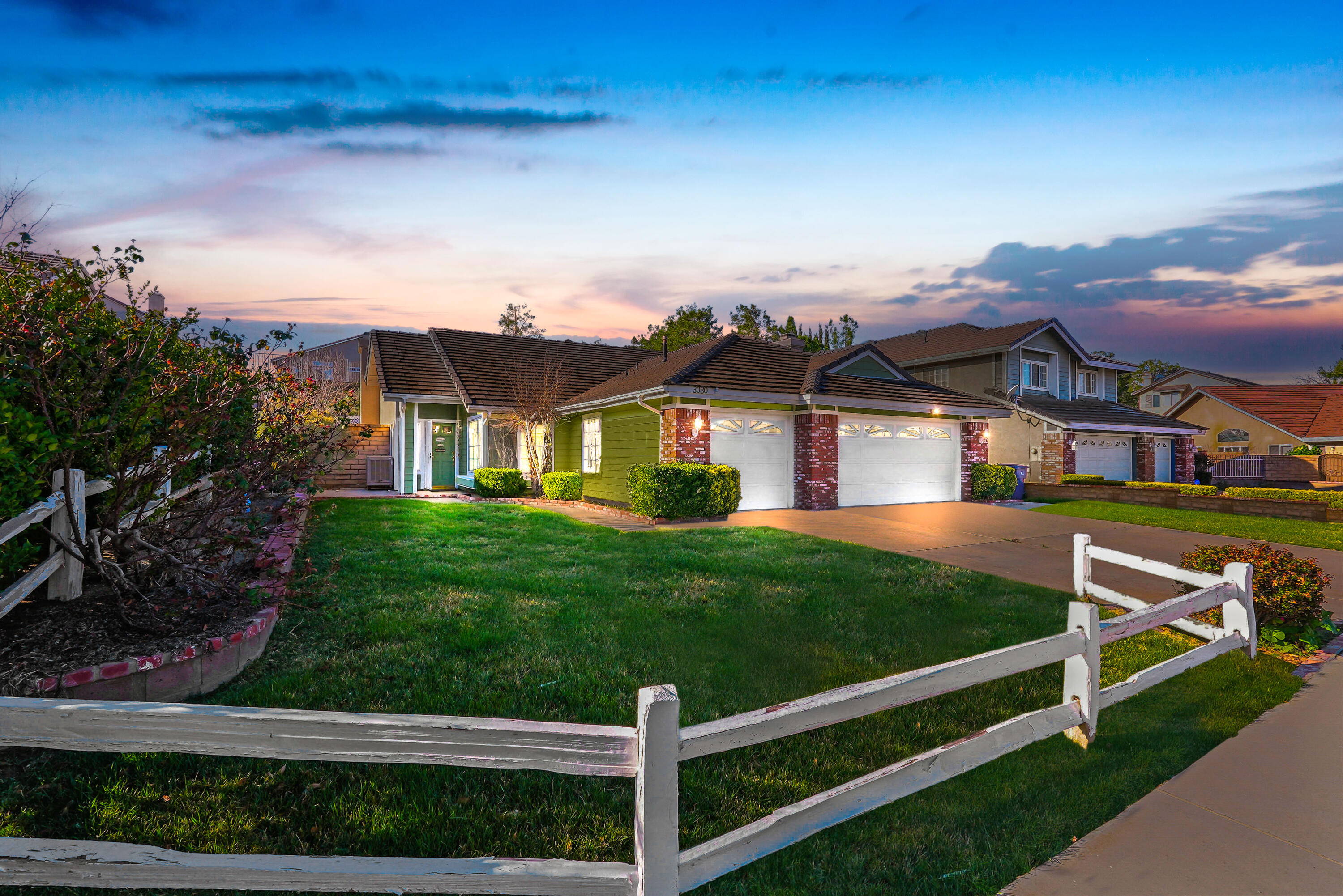 3030 Quarry Road Palmdale, CA 93550 - Photo 2 of 46 a front view of a house with a yard