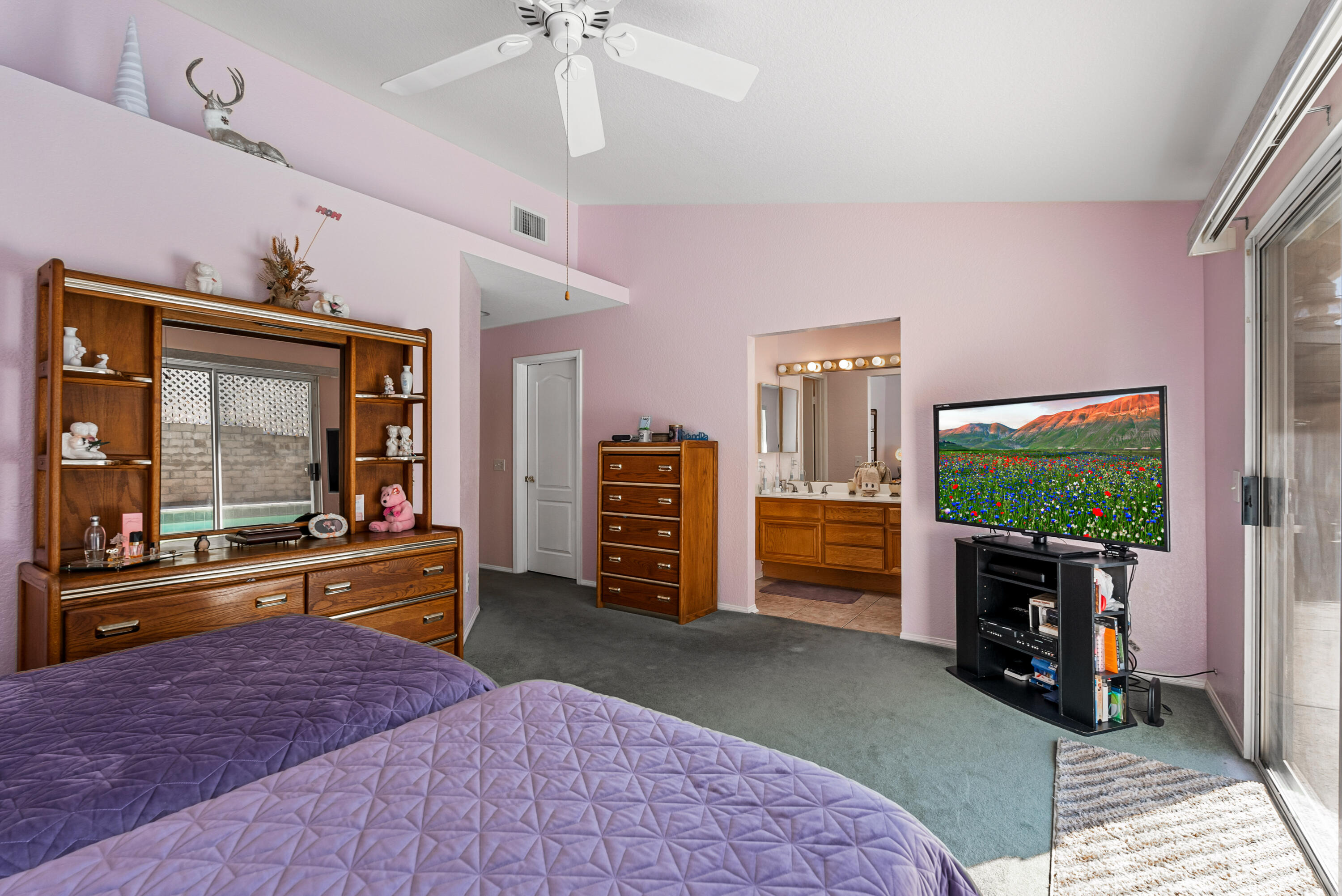 3030 Quarry Road Palmdale, CA 93550 - Photo 22 of 46 a room with furniture and a flat screen tv