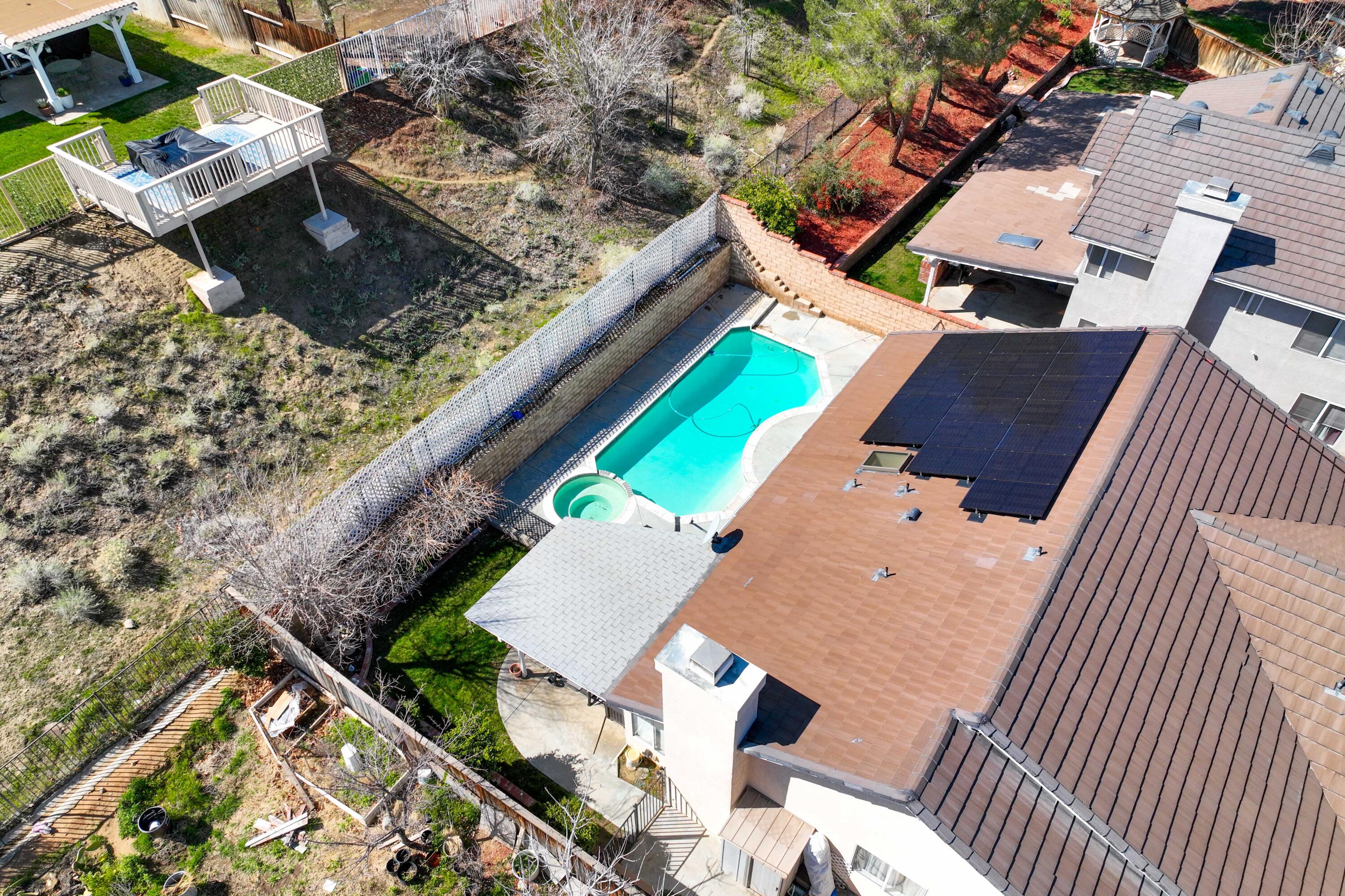 3030 Quarry Road Palmdale, CA 93550 - Photo 42 of 46 an aerial view of a house with a yard