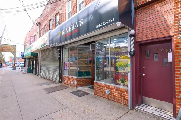 a view of shops on the street