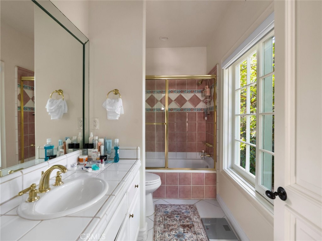 6000 Cavalleri Road Malibu, CA 90265 - Photo 40 of 44 a bathroom with a tub and a sink
