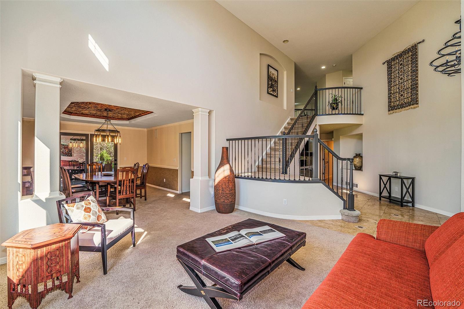 3822 Broadmoor Loop Broomfield, CO 80023 - Photo 16 of 40 a living room with furniture and a table