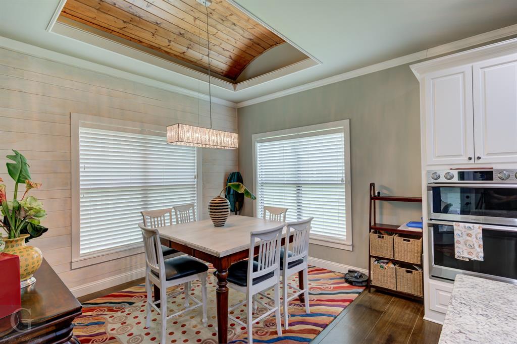 7453 Shirley Francis Road Shreveport, LA 71129 - Photo 13 of 30 a view of a dining room with furniture and wooden floor