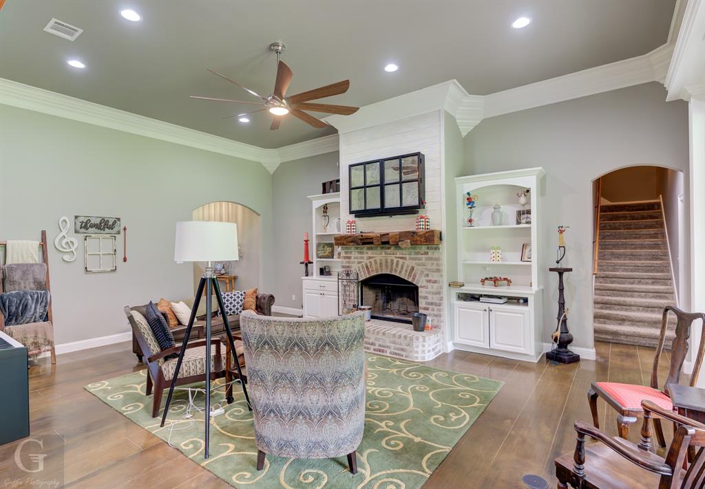 7453 Shirley Francis Road Shreveport, LA 71129 - Photo 10 of 30 a living room with furniture and a fireplace