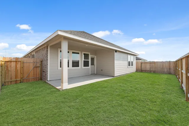 a view of a backyard with a garden