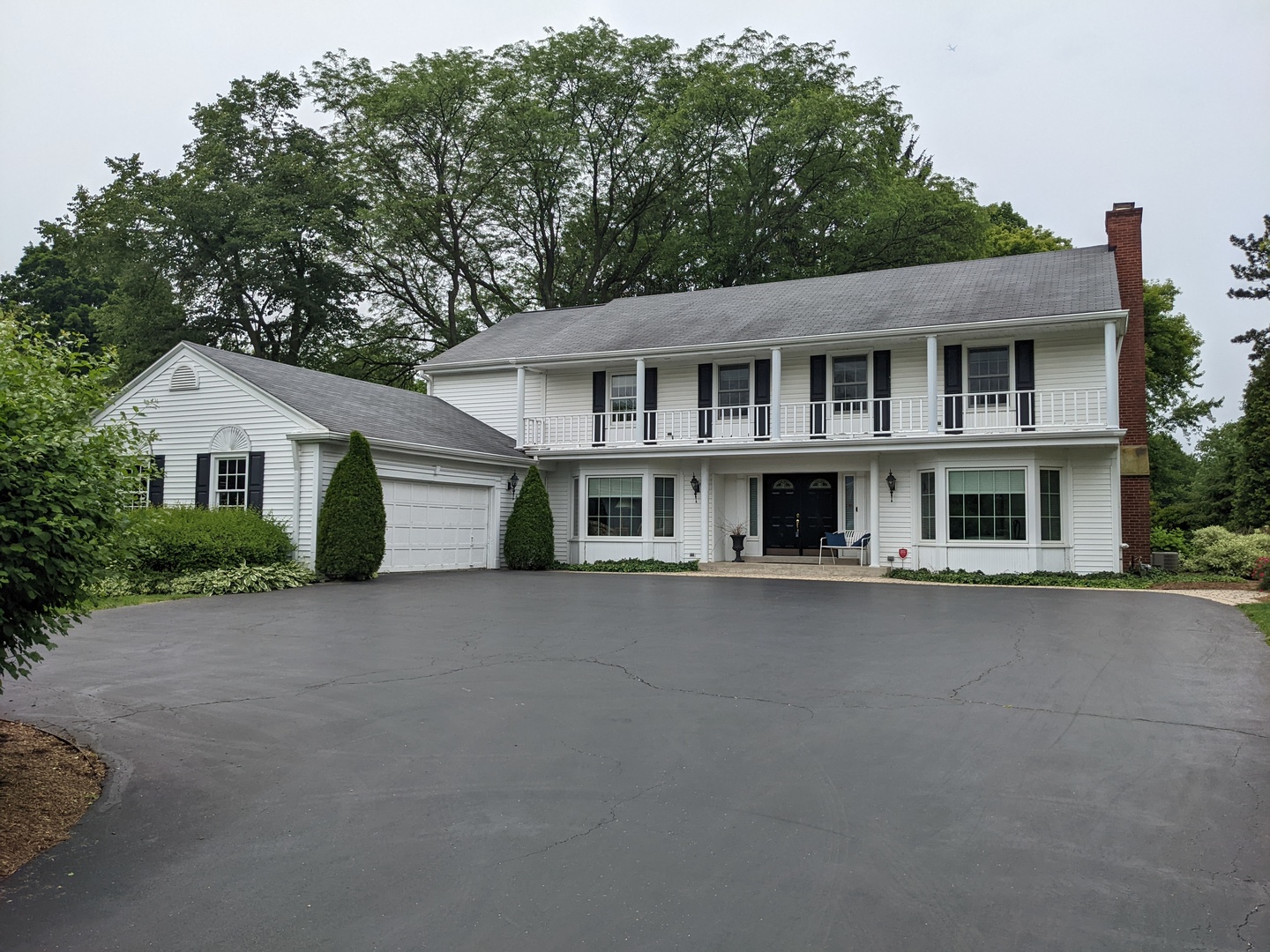 306 Firth Road Inverness, IL 60067 - Photo 1 of 1 a front view of a house with a garden