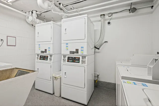 a view of a storage & utility room with washer and dryer