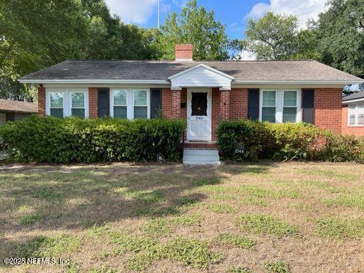 2144 Southampton Road Jacksonville, FL 32207 - Photo 1 of 27 a front view of a house with yard and green space