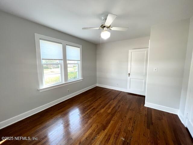 2144 Southampton Road Jacksonville, FL 32207 - Photo 11 of 27 a view of an empty room with wooden floor and a window