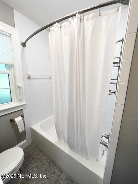 2144 Southampton Road Jacksonville, FL 32207 - Photo 14 of 27 a bathroom with a shower curtain and a sink