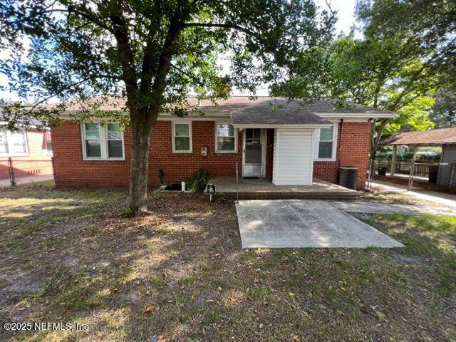 2144 Southampton Road Jacksonville, FL 32207 - Photo 25 of 27 a view of a yard in front of a house with large tree