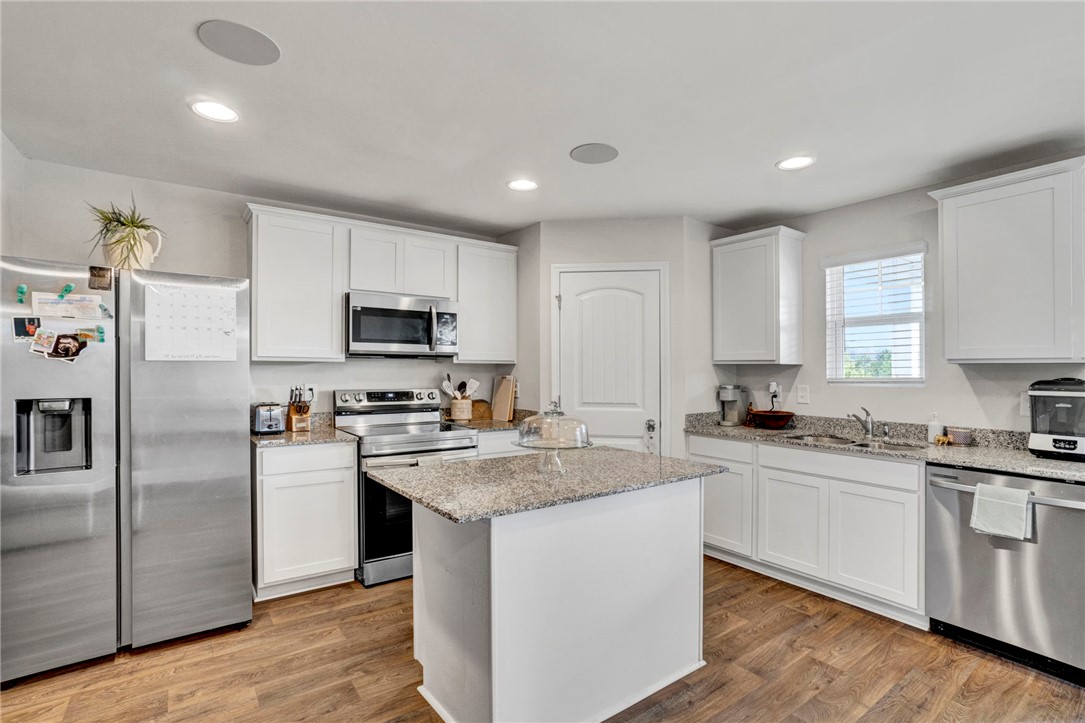 221 Samuel Street Pendleton, SC 29670 - Photo 11 of 34 This bright kitchen features modern appliances and ample counter space for culinary endeavors.