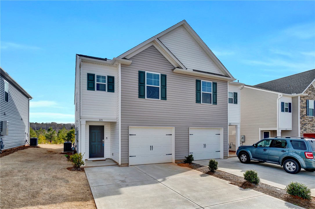 221 Samuel Street Pendleton, SC 29670 - Photo 2 of 34 This charming duplex home features convenient attached garages and a tidy, low-maintenance yard.
