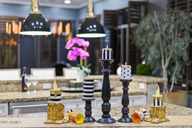 a view of a house with a big yard and potted plants